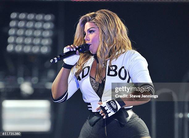 Lil' Kim performs at the Bad Boy Family Reunion Tour at ORACLE Arena on September 30, 2016 in Oakland, California.