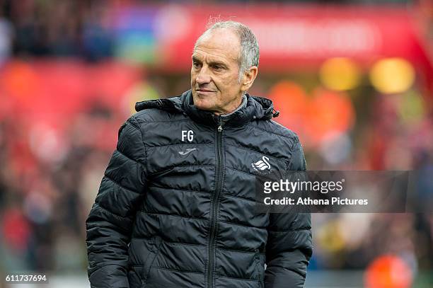 Francesco Guidolin, Manager of Swansea City looks on during the Premier League match between Swansea City and Liverpool at The Liberty Stadium on...