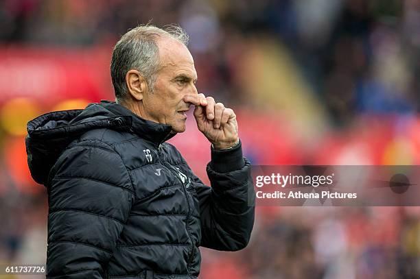 Francesco Guidolin, Manager of Swansea City looks on during the Premier League match between Swansea City and Liverpool at The Liberty Stadium on...