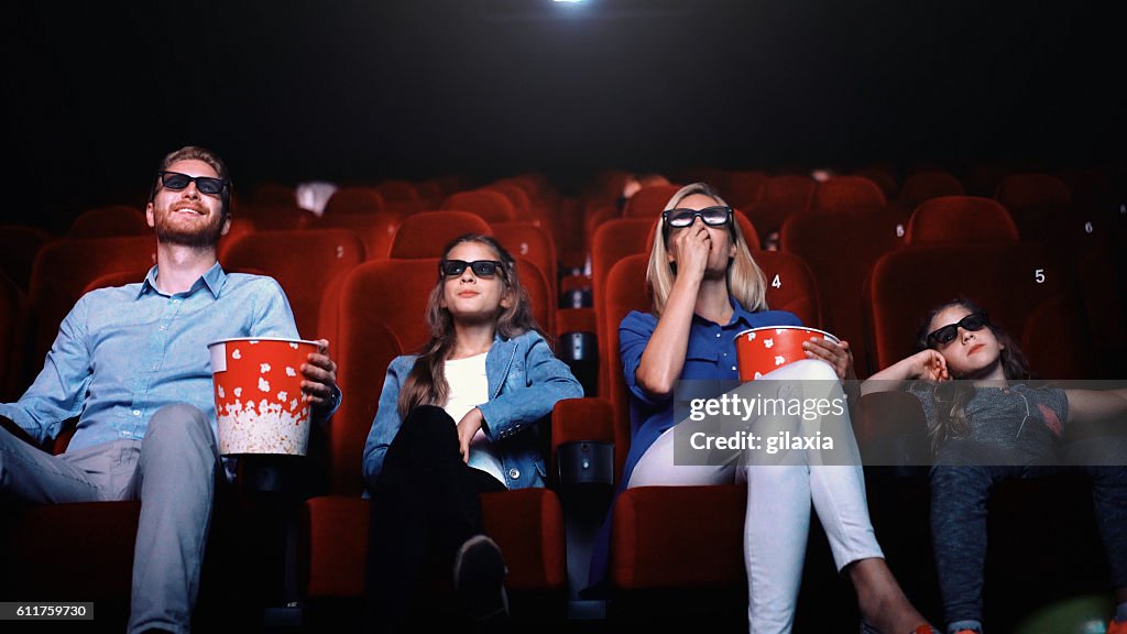 Family in a movie theater.