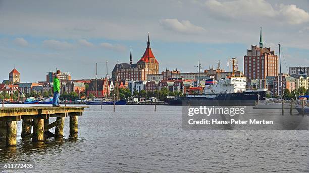 skyline of rostock with unterwarnow river - rostock stock pictures, royalty-free photos & images