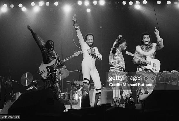 American soul, funk and disco group Earth, Wind & Fire performing on stage, USA, 3rd February 1978. Left to right: Verdine White, Maurice White,...