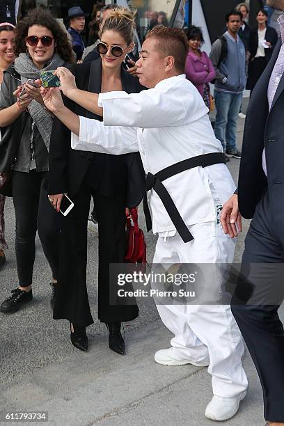 Olivia Palermo takes a selfie with Tetsuro Degawa outside the Elie Saab show as part of the Paris Fashion Week Womenswear Spring/Summer 2017 on...