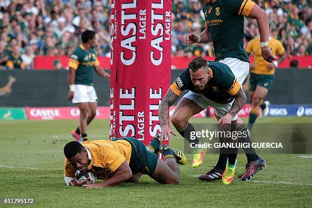 Australian prop Scott Sio scores a try during the Castle Lager Rugby Championship international test match between South Africa and Australia at the...