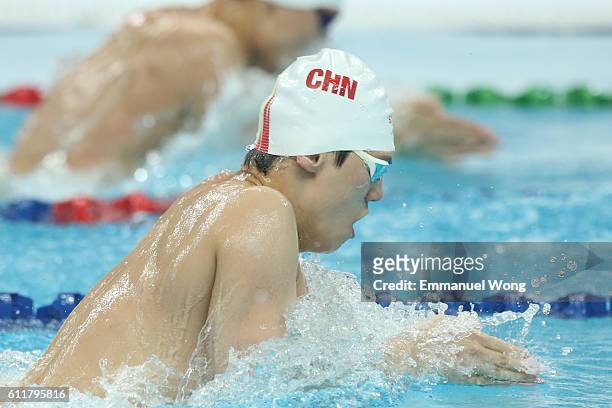 Li Xiang of China competes in the Men's 100m breaststroke final on day two of the FINA swimming world cup 2016 at Water Cube on October 1, 2016 in...