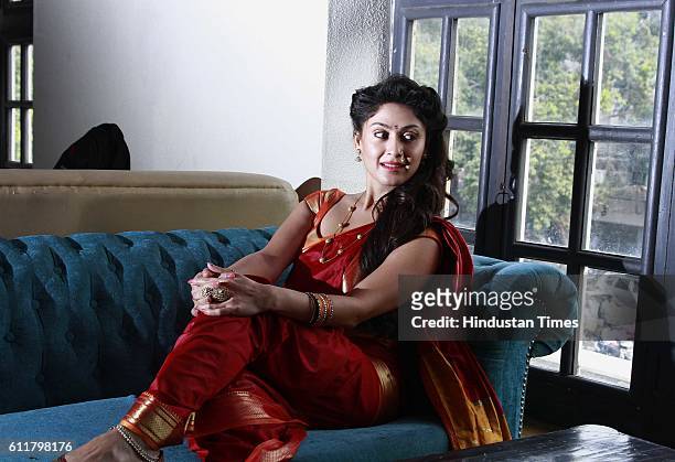 Bollywood actor Manjari Fadnis poses during a press conference for the promotion of her upcoming movie Wah Taj at FLYP@MTV Cafe, on September 19,...