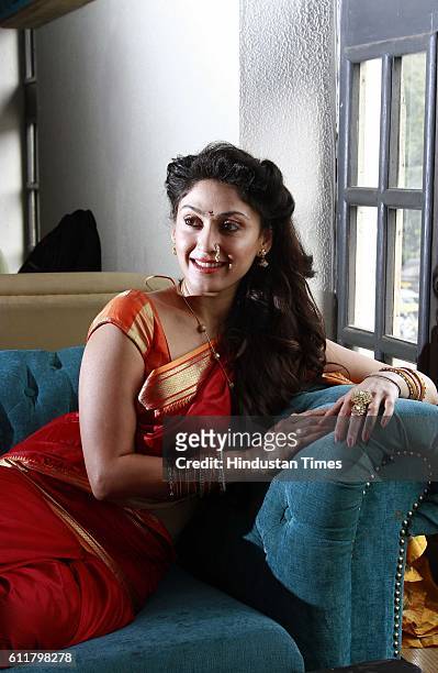 Bollywood actor Manjari Fadnis poses during a press conference for the promotion of her upcoming movie Wah Taj at FLYP@MTV Cafe, on September 19,...