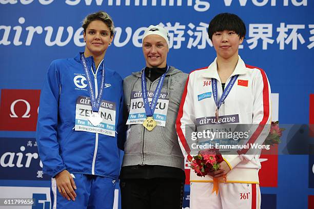 Gold medalist Katinka Hosszu of Hungary , Silver medalist Daryna Zevina of Ukraine and bronze medalist Chen Jie of China pose during the medal...