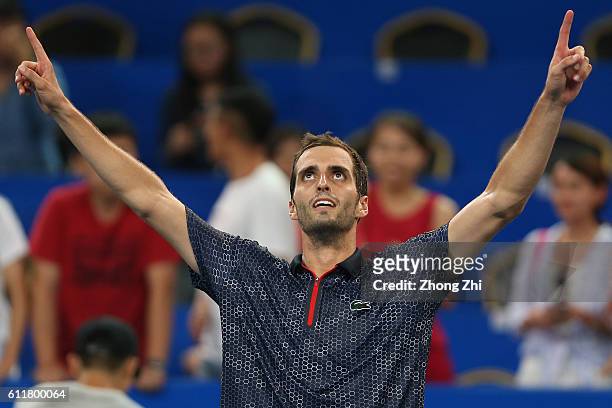Albert Ramos-Vinolas of Spain celebrates after winning the semi final match against Grigor Dimitrov of Bulgaria during Day 6 of 2016 ATP Chengdu Open...