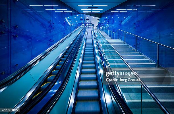 escalators - escalator stock pictures, royalty-free photos & images
