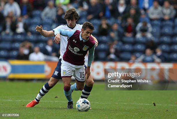 Aston Villa's Ashley Westwood shields the ball from Preston North End's Ben Pearson during the Sky Bet Championship match between Preston North End...