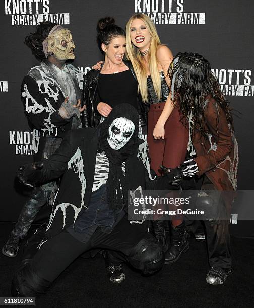 Actors Shenae Grimes and AnnaLynne McCord arrive at the Knott's Scary Farm Black Carpet Event at Knott's Berry Farm on September 30, 2016 in Buena...