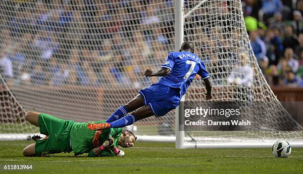 Chelsea's Ramires goes down in the penalty area under the challenge of Manchester City goalkeeper Richard Wright