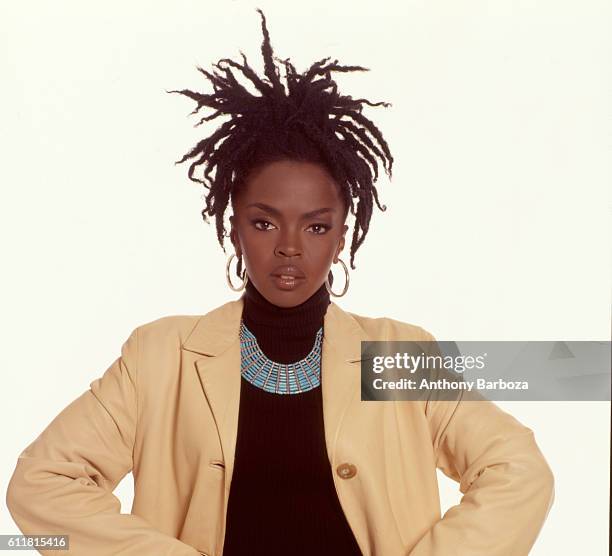 Portrait of American Pop and Rhythm & Blues musician Lauryn Hill as she poses against a white background, New York, New York, 1998.