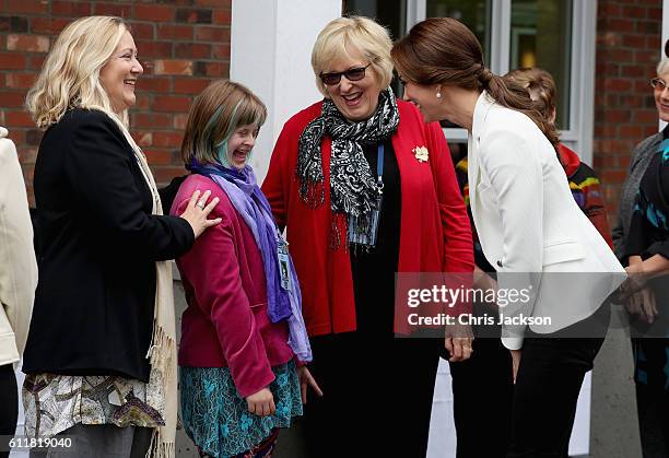 Catherine, Duchess of Cambridge meets children and families at the Cridge Centre for the Family on the final day of their Royal Tour of Canada on...