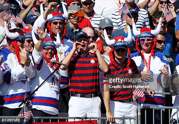 Brandt Snedeker and Zach Johnson of the United States celebrate with fans in the crowd during afternoon fourball matches of the 2016 Ryder Cup at...