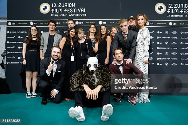 Rapper Cro poses with members of his team at the 'Unsere Zeit ist jetzt' premiere during the 12th Zurich Film Festival on October 1, 2016 in Zurich,...