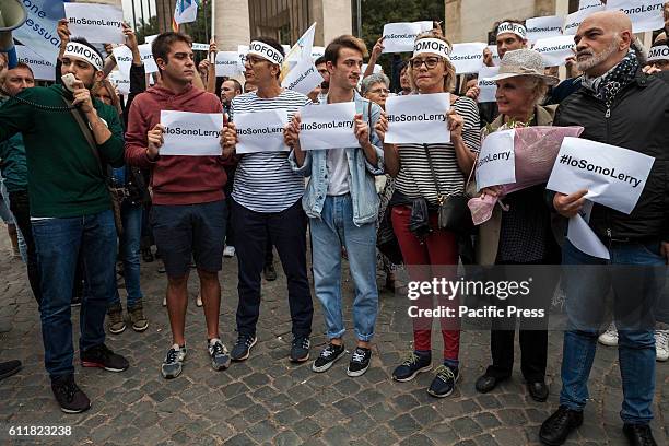 Members of Italian LGBTQI communities and supporters of gay rights take part in a rally to protest against homophobia in Rome, Italy. The members of...