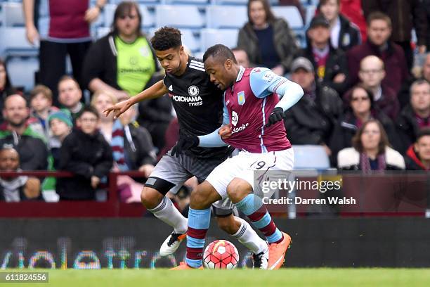 Chelsea's Jake Clarke-Salter and Aston Villa's Jordan Ayew battle for the ball