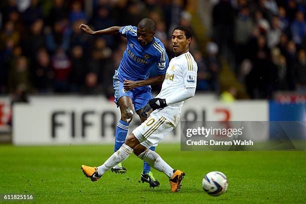 Swansea City's Jonathan de Guzman and Chelsea's Nascimento Ramires battle for the ball