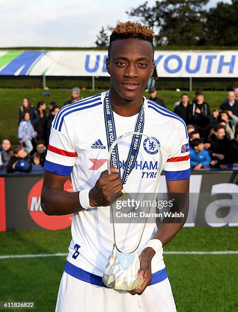 Chelsea's Tammy Abraham celebrates with the trophy
