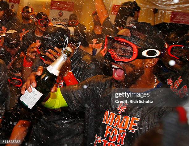 Jose Reyes of the New York Mets celebrates with his teammates after the Mets defeated the Philadelphia Phillies 5-3 during a game at Citizens Bank...