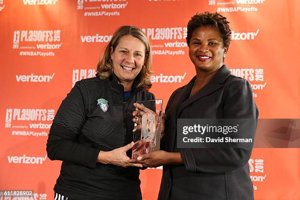 Head coach Cheryl Reeve of the Minnesota Lynx receives the 2016 WNBA Coach of the Year Award from WNBA Chief of Basketball Operations/Player...