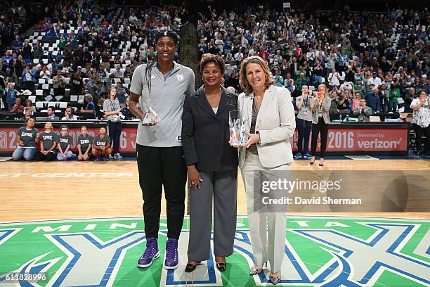 Sylvia Fowles of the Minnesota Lynx receives the 2016 WNBA Defensive Player of the Year Award and Head coach Cheryl Reeve of the Minnesota Lynx...