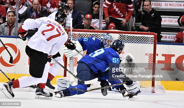 Alex Pietrangelo of Team Canada fires a shot wide past Roman Josi and Jaroslav Halak of Team Europe during Game Two of the World Cup of Hockey 2016...
