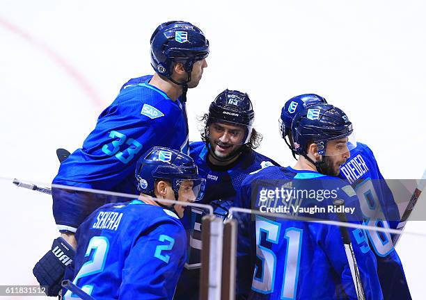 V33#2 celebrates his goal with Andrej Sekera, Frans Nielsen, Mats Zuccarello and Frans Nielsen of Team Europe during Game Two of the World Cup of...