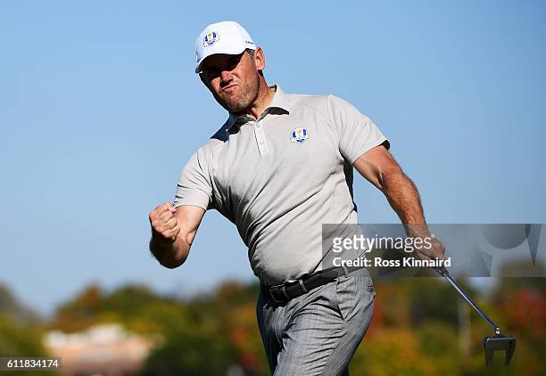 Lee Westwood of Europe reacts to a birdie putt on the seventh green during afternoon fourball matches of the 2016 Ryder Cup at Hazeltine National...