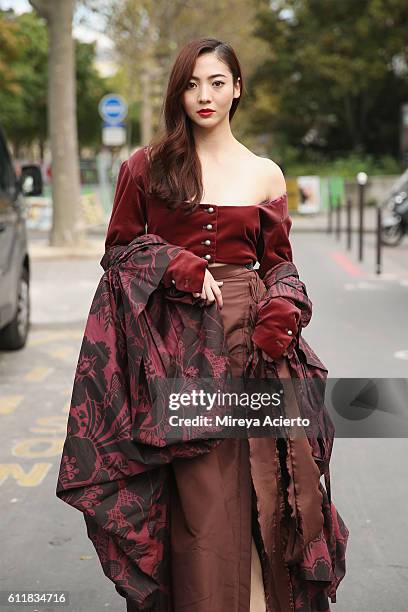 Actress, Aggie Hsieh seen wearing Vivienne Westwood during Paris Fashion Week Spring/Summer 2017 on October 1, 2016 in Paris, France.