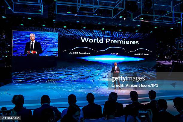 Of Audi Rupert Stadler delivers a speech during the press preview of the Paris Motor Show at Paris Expo Porte de Versailles on September 29, 2016 in...