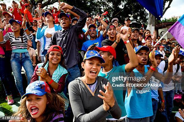 Supporters of Venezuelan President Nicolas Maduro take part in the commemoration of the 2nd anniversary of the death of deputy Robert Serra at...