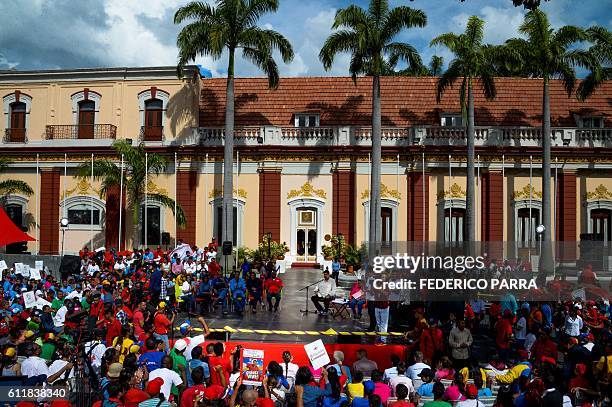 Supporters of Venezuelan President Nicolas Maduro take part in the commemoration of the 2nd anniversary of the death of deputy Robert Serra at...