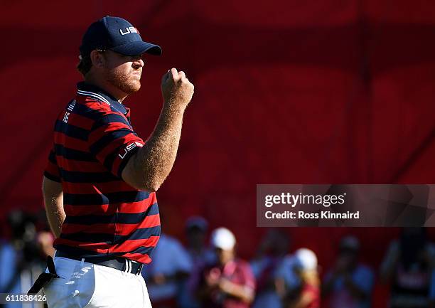 Holmes of the United States reacts to a birdie putt on the 11th green during afternoon fourball matches of the 2016 Ryder Cup at Hazeltine National...