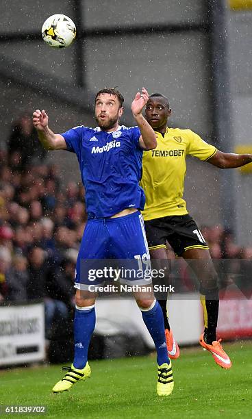 October 1: Rickie Lambert of Cardiff City and Lucas Akins of Burton Albion in action during the Sky Bet Championship match between Burton Albion and...