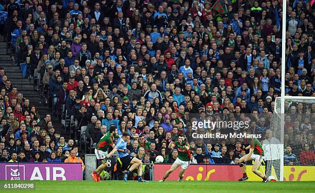 Dublin , Ireland - 1 October 2016; Cormac Costello of Dublin, under pressure from Mayo players Kevin McLoughlin, left, Brendan Harrison and Diarmuid...
