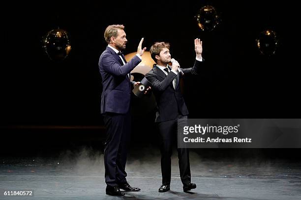 Moderator Steven Gaetjen and Daniel Radcliffe present the award for international documentary on stage during the Award Night Ceremony during the...