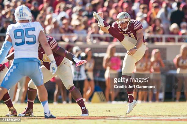 Larry Fedora of the Florida State Seminoles punts against the North Carolina Tar Heels during the game at Doak Campbell Stadium on October 1, 2016 in...