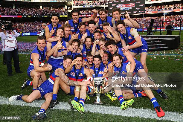 Bulldogs players celebrate the win during the 2016 AFL Grand Final match between the Sydney Swans and the Western Bulldogs at Melbourne Cricket...