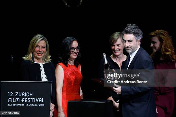 William Oldroyd receives the award for international movie for his movie 'Lady Macbeth' on stage during the Award Night Ceremony during the 12th...