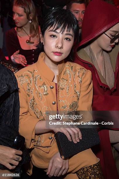 Liu Xuan attends the Vivienne Westwood show as part of the Paris Fashion Week Womenswear Spring/Summer 2017 on October 1, 2016 in Paris, France.