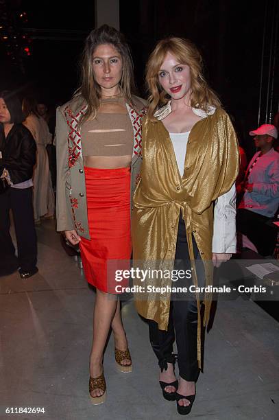 Stella Schnabel and Christina Hendricks attend the Vivienne Westwood show as part of the Paris Fashion Week Womenswear Spring/Summer 2017 on October...