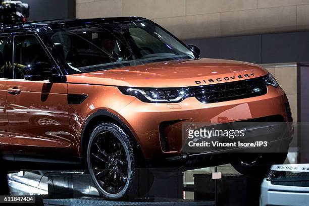 Land Rover brand presents their latest Land Rover Discovery car during the press preview of the Paris Motor Show at Paris Expo Porte de Versailles on...