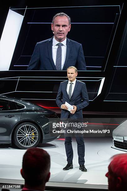 Of Porsche Oliver Blume delivers a speech during the press preview of the Paris Motor Show at Paris Expo Porte de Versailles on September 29, 2016 in...