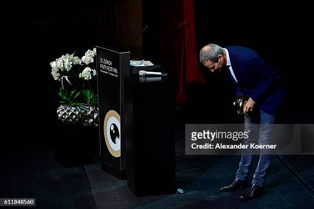 Olivier Assayas gives his acceptance speech after receiving the 'Tribute to...' on stage during the Award Night Ceremony during the 12th Zurich Film...