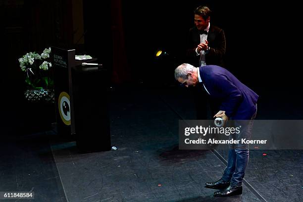 Olivier Assayas gives his acceptance speech after receiving the 'Tribute to...' on stage during the Award Night Ceremony during the 12th Zurich Film...