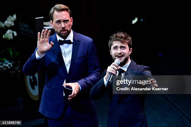 Moderator Steven Gaetjen and Daniel Radcliffe present the award for international documentary on stage during the Award Night Ceremony during the...