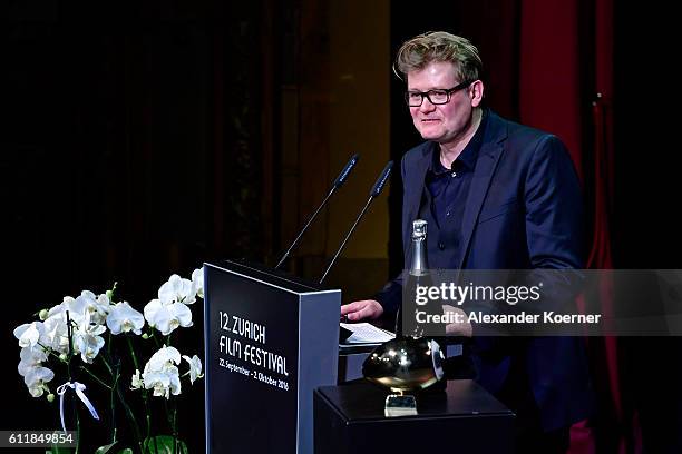 Valentin Hitz gives his acceptance speech after receiving the after receiving the 'Focus' award for his movie 'Stille Reserven' on stage during the...